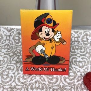 A world of Thanks button collectible from Disney